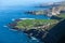 Shoreline of northern side of Tenerife island with blue Atlantic ocean. Aerial view at green plantations. Canary, Spain, Europe