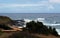 Shoreline over a bridge to the ocean.