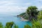 Shoreline with sea and bright sky at Laem Phromthep view point Phuket, Thailand