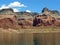 Shorelne with sandstone cliffs on Lake Powell of Lake Powell.