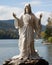 On the shores of a serene lake, a statue of Jesus stands as a beacon of hope and faith, overlooking the tranquil waters