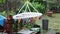 short high definition clip of an empty washing line and pegs in a heavy rain downpour