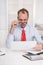 Short sighted at work - balding businessman looking through glasses at document - funny