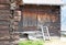 Short wooden stairs to old wooden cabin