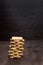Shortbread cookie on a wooden table. Tower of cookies. Wooden background