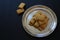 Shortbread cookies with chocolate filling, small cookies on a silver tray, a mound of fresh cookies, an addition to tea or coffee