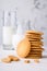 Shortbread kamut cookies with glass and jug of milk