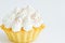 Shortbread Tartlet with Whipped Swiss Meringues Cream Frosting on White Background. Elegant European Italian Wedding Pastries