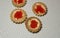 Shortbread tartlets with red caviar and butter