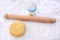 Shortcrust pastry with a rolling pin and flour drifter