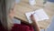 Shot above of hands of Beautiful and young successful business woman with notepad in a cafe, working as a freelancer