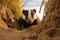 Shot of badger resting at entrance hole burrow mouth