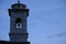 Shot of a bell tower in San Marino surrounded by a pristine blue sky