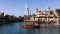 Shot of a boat moving in lake with the Burj Al Arab Hotel in background, Dubai, United Arab Emirates