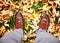 A shot of brown and white boat or deck shoes done with a retro vintage instagram filter app or action effect in leaves and grass d