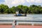 A shot of the dredging rig in the Savannah River with vast river water, blue sky and clouds