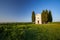 Shot of the famous historic Chapel Vitaleta in the middle of a field in Italy