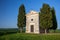 Shot of the famous historic Chapel Vitaleta in the middle of a field in Italy