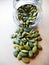 Shot of fresh pumpkin seeds in and outside glass jar