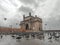 Shot Of Gateway Of India With Pigeons In The Foreground And A Cloudy Sky