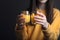 Shot of Hands holding glasses of orange juice generative AI