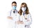 Shot of male and female doctors wearing face mask while standing together at isolated white background