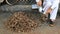 Shot of a man filling spices in polybags at spice market in Dubai, United Arab Emirates