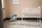 Shot of minimalistic sunny baby\\\'s room interior with child\\\'s bed