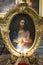 Shot of the most famous image of the Sacred Heart of Jesus in a golden frame