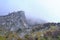 Shot of Mount Resegone on a foggy day, Lecco, Italy