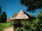 A shot of octagonal shaped gazebo on a public park