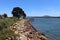 Shot of the rocky south coast of Green Well Point in Australia with beautiful buildings