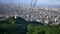 shot of sapporro city from a cable car going up mountain moiwa, hokkaido, japan