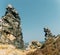 Shot of stone cliffs against clear blue sky