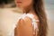 Shoulder of beautiful bride in wedding dress