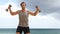 Shoulder Dumbbell Side Raise exercise - Fitness man lifting dumbbells on beach