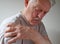 Shoulder joint pain on an older man