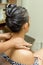 Shoulder massage at hairdressing salon