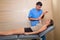 Shoulder physiotherapy doctor therapist and woman patient
