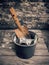 Shovel and flowerpot of American dollar on the wood background.