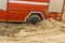 Shovel stuck next to a buried wheel fire engine.