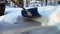 Shoveling snow from sidewalk after a storm in Minnesota on a cold winter day. Closeup footage