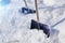 Shovels stuck in snowdrift. close up