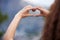 Show nature some love. Rearview shot of an unrecognizable young woman out for an early morning hike in the mountains.