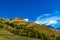 Show in the Varaita Valley: from the summit of Mount Peyron with a view of Lake Pontechianale and the top of Monviso