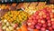 Showcase with Tangerines, Apples, Pears, Persimmon and Different Fruit on the Street Market
