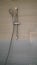 Shower and shower holder. modern chrome shower attachment with thermostatic controller