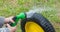 In the shower wash the wheel from the garden truck.