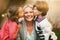 Showering Mom with some love. Portrait of a mother being kissed on either side of her cheeks by her two children.