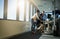 Showing off his latest idea. Full length shot of three young businesspeople working together in their office.